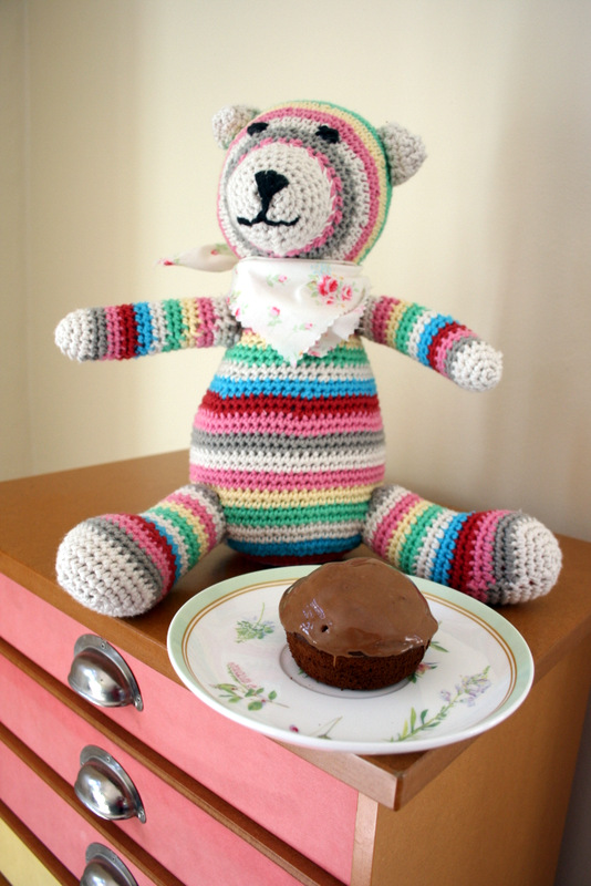 A simple cupcake with the best sauce-y frosting you could ask for. No wonder Rainbow Teddy has a smile on his face