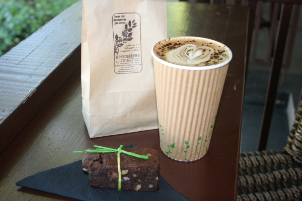Latté art and a mocha-nut truffle slice. Only 15% flour in that brownie chunk of gold